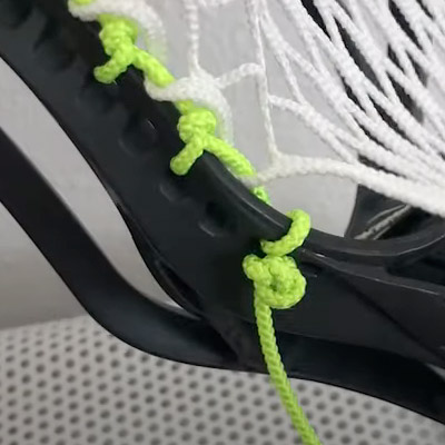 Final side knot for lacrosse head